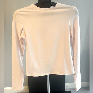 SKIMS  NWT color “barely pink” cotton jersey, long sleeve T-shirt, size large